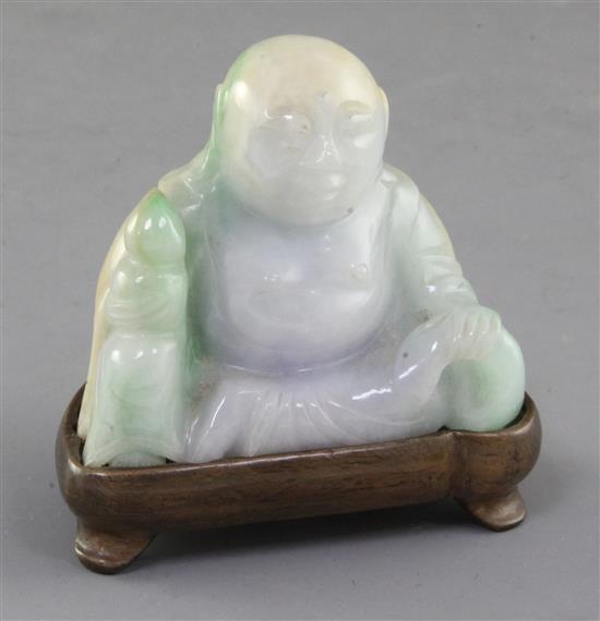 A Chinese jadeite seated figure of Budai, height 6.2cm, wood stand